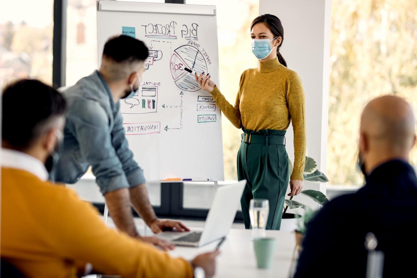 Person reviewing financial documents with focused attention